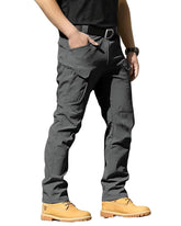 LYRXXX front view dark gray showing fit and utility pockets for versatile wear