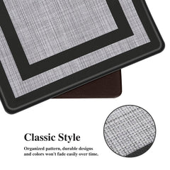 Mattitude mats placed by sink demonstrating standing comfort while washing dishes