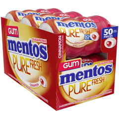hand holding Mentos cinnamon bottle demonstrating portable bottle size and easy carry