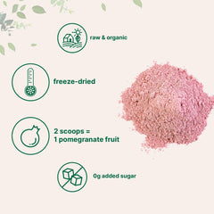 Scoop measuring pomegranate powder from Micro Ingredients pouch for accurate servings