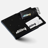 Milky front packaging Cosmic Black showing compact tablet pack and sleek design