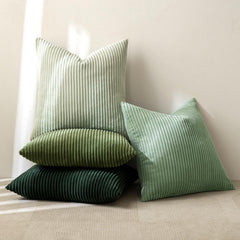 MIULEE styled on a sofa showing how the green covers warm living spaces