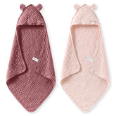 Momcozy front view hooded towel in pink showing full coverage and cozy wrap benefit