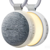 Momcozy front view showing compact white device and clip for portable sleep support