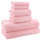 MOONQUEEN front packaging showing six-piece pink towel set and compact storage benefit