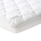 Moonsea front view showing fitted pad protecting a pack and play mattress with comfort