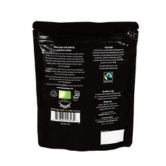 Mount Hagen refill pouch being poured into a reusable jar for freshness