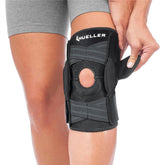 MUELLER front view of knee brace showing fit and compression benefits