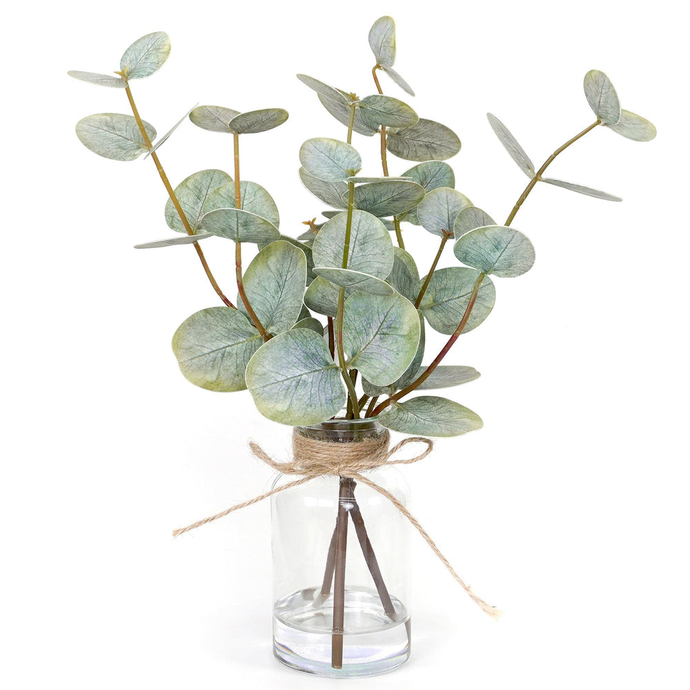 Muhanjia front view of eucalyptus stems in glass vase showing elegant centerpiece benefit