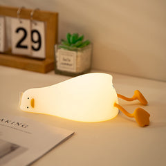 MUID Benson Duck lying flat front view showing warm glow and friendly face for comfort