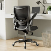 MUXX.STIL front view of chair showing ergonomic shape and breathable mesh comfort