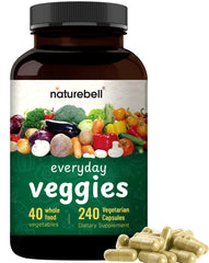 NatureBell fruit blend powder on a spoon highlighting natural berry and tropical fruit sources and antioxidant variety