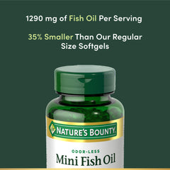 Nature's Bounty softgel next to a coin to show mini fish oil size and swallowability benefit