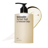 Nécessaire front bottle view showing minimalist packaging and gentle formula benefits