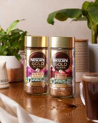 Pouring Nescafe into mug demonstrating quick mixability and convenience