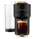 Nespresso Vertuo Pop+ front view showing sleek black and gold design and compact footprint