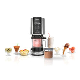 Ninja CREAMi front view showing compact motor base and included pints for quick dessert making
