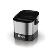 Ninja knock box front view showing stainless finish and tidy puck storage benefit