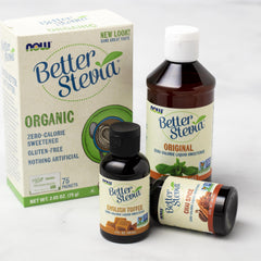 NOW BetterStevia bottle next to measuring cup showing compact, long-lasting size