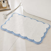 Ohocut front view white rug with blue scalloped piping shows clean aesthetic and softness