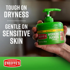 O'Keeffe's cream texture on fingertip showing rich non-greasy absorption