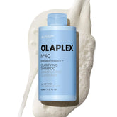 Olaplex bottle front view showing 250 mL and branding, highlights professional quality