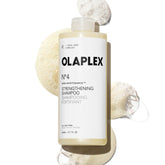 Olaplex front bottle shot showing product and repair benefits