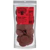 Old Trapper front pack showing 21 oz resealable bag and spicy label, clear view benefits portability