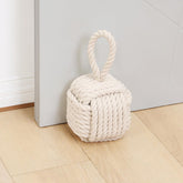 Optish beige rope doorstop front view showing knot and soft cotton finish for gentle floor protection