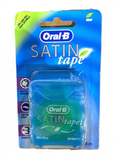 Oral-B front packaging showing six mint floss dispensers and benefits