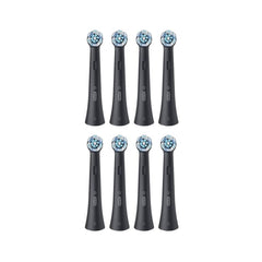 Oral-B toothbrush head in use close-up demonstrating bristle contact for improved plaque removal