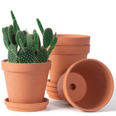 Orceler front view of four terracotta pots showing tasteful set and display benefit