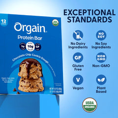 Orgain bar next to smartphone to show compact size and portability advantage