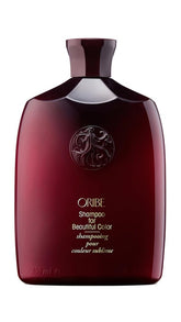 Oribe shampoo front packaging showing label and luxury bottle, protects color