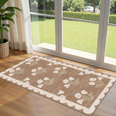 Othilic front view of tan floral mat showing entrance curb appeal