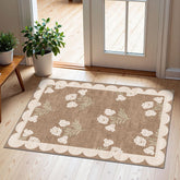 Othilic front view scalloped tan floral mat showing welcoming entry benefit