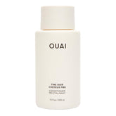 OUAI bottle front view showing volumizing conditioner for lighter hair