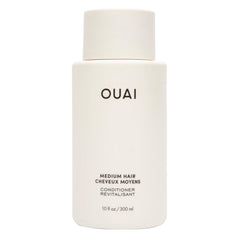 OUAI medium conditioner front bottle showing clean design and brand benefit