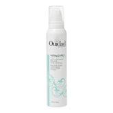 Ouidad bottle front packaging showing label and easy-pump benefit