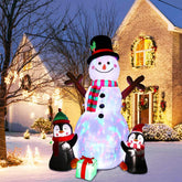 OurWarm front view of snowman and penguins lighting yard
