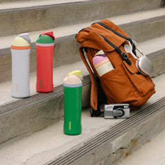 Owala FreeSip lid detail with push-button lock for hygienic protection