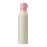 Owala FreeSip Twist Daybreak front view showing sleek insulated design and easy carry loop