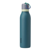 Owala FreeSip Twist 24 oz denim front view showing sleek bottle and finish benefit insulation