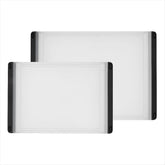 OXO front view of 2-piece cutting board set showing both boards and packaging benefit organization