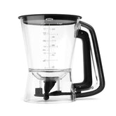 OXO Good Grips dispenser front view showing ergonomic handle and clear body for easy pouring