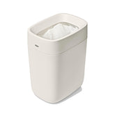 OXO front view white trash can showing compact modern design and tidy look