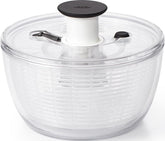 OXO small salad spinner front view showing compact bowl and lid benefit: space-saving prep