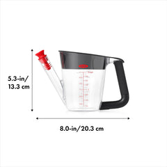 OXO Good Grips stopper stored in strainer preventing loss and clutter