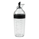 OXO Good Grips shaker front view showing compact 1.5 cup capacity and clear body for easy measuring