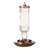 Perky-Pet feeder front view showing antique glass and vintage charm